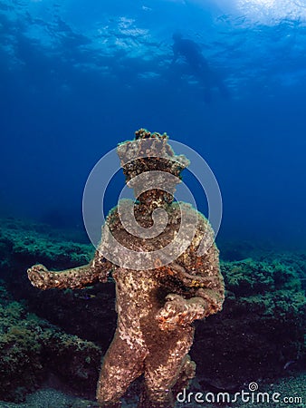 Statue of Dionysus with a crown of ivy in Claudioâ€™s Ninfeum. underwater, archeology. Stock Photo